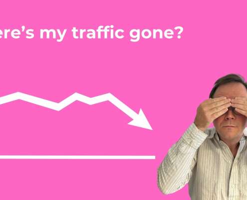 A downward pointing graph underneath text saying "Why has my website traffic dropped?" and Simon hiding their eyes with their hands.